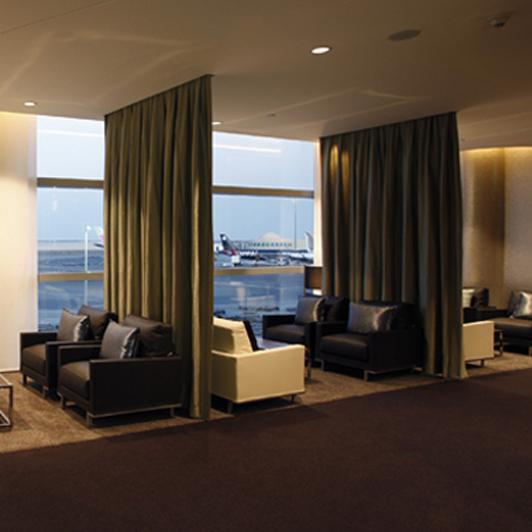 Lounge at the airport with curtains as acoustic room dividers