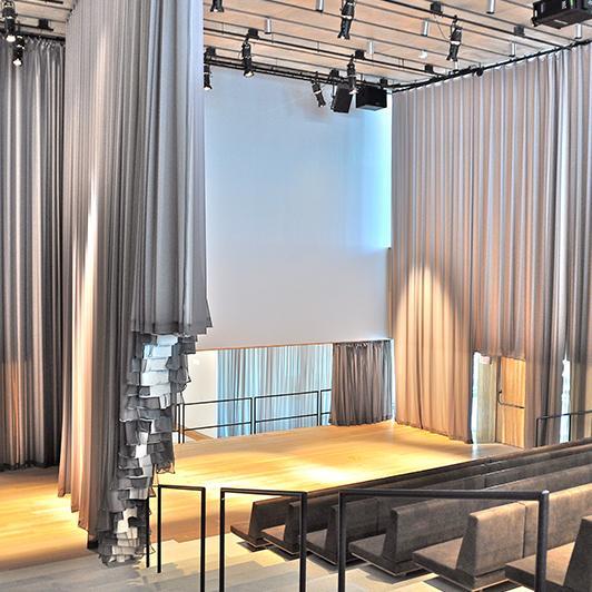 View of auditorium with open soundproof curtain