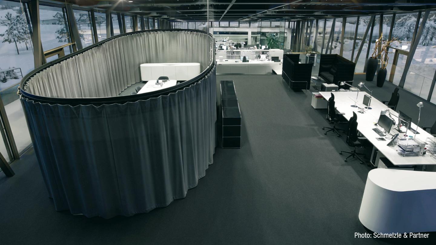 Meeting island with soundproof curtain in open-plan office