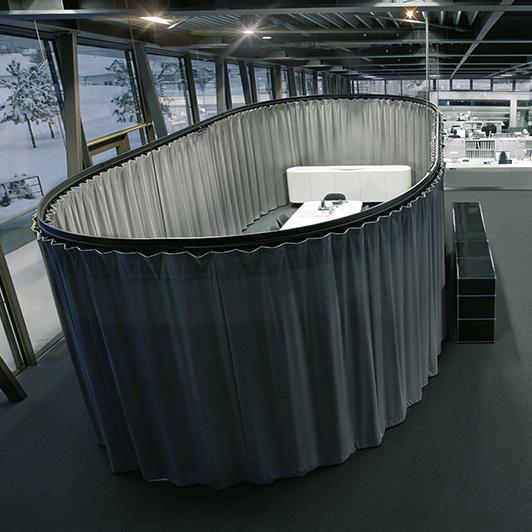 Acoustically separated meeting island in open-plan office