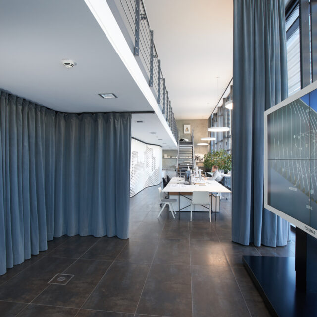 Acoustic curtains for office with open gallery