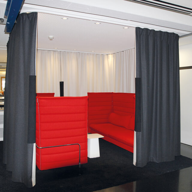 Soundproof curtain encloses quiet zone in the office